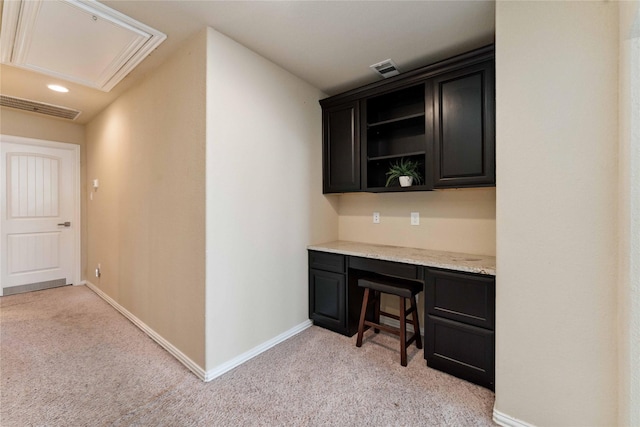 17522 Mineral Bluff Ln, Humble, TX 77346 - bar area featuring light colored carpet, built in desk, and recessed lighting