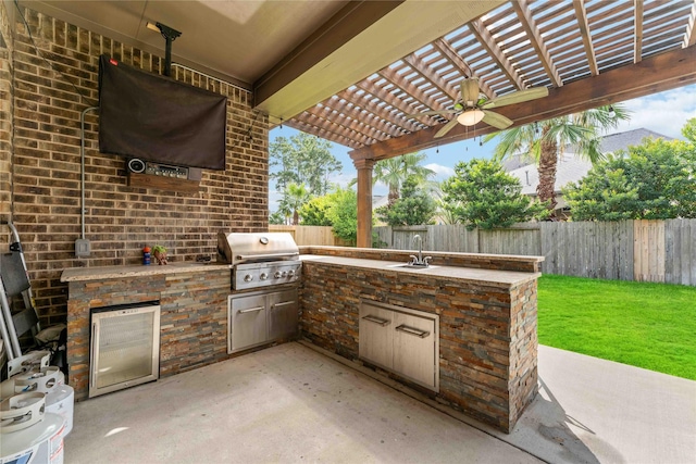 17522 Mineral Bluff Ln, Humble, TX 77346 - fenced backyard featuring area for grilling, ceiling fan, a patio area, and a pergola