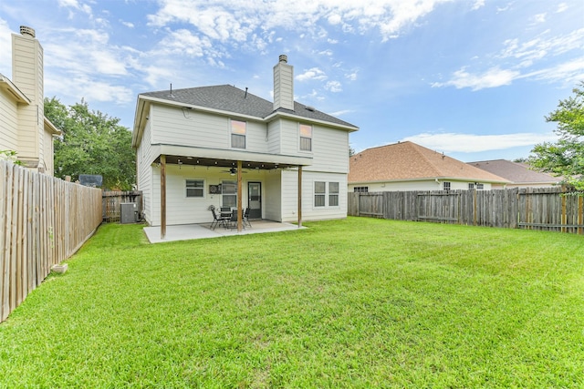 7242 Foxcrest Ln, Humble, TX 77338 - rear view of house with a ceiling fan, a fenced backyard, a patio area, and a chimney