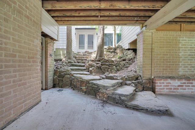 1 Woodstone St, Houston, TX 77024 - miscellaneous room with concrete floors