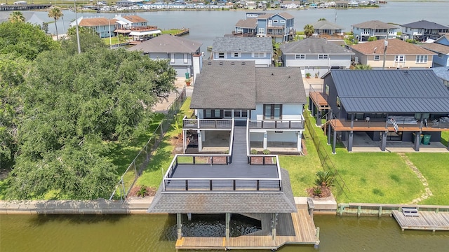 38 N Flamingo St, La Marque, TX 77568 - aerial view of residential area with a nearby body of water