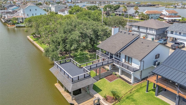 38 N Flamingo St, La Marque, TX 77568 - aerial view of residential area with a nearby body of water