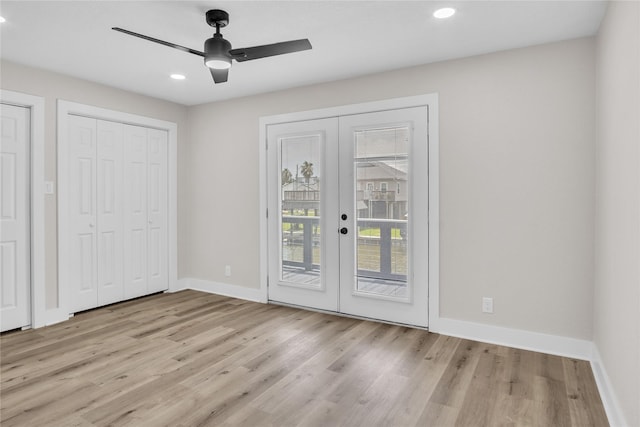 38 N Flamingo St, La Marque, TX 77568 - unfurnished bedroom with access to exterior, french doors, light wood-type flooring, recessed lighting, and a ceiling fan