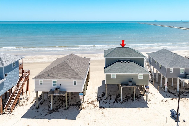 1314 Seashell Dr, Surfside Beach, TX 77541 - aerial view of property and surrounding area featuring expansive beach