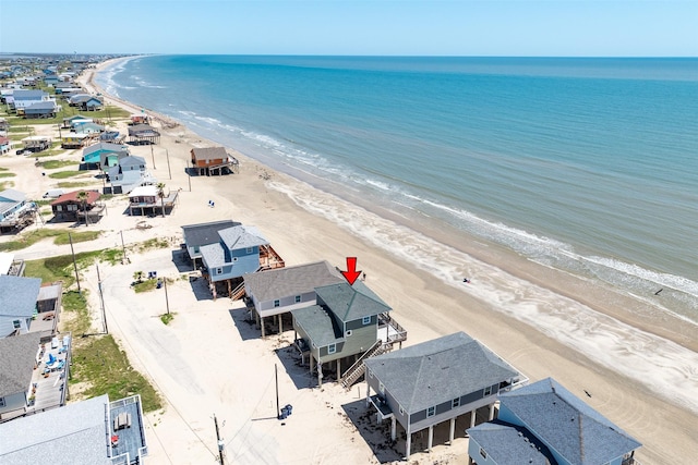 1314 Seashell Dr, Surfside Beach, TX 77541 - drone / aerial view of waterfront with a beach