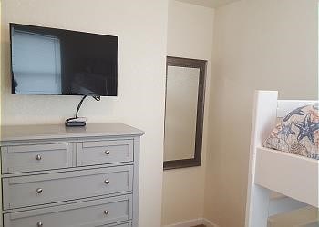 1314 Seashell Dr, Surfside Beach, TX 77541 - bedroom with baseboards