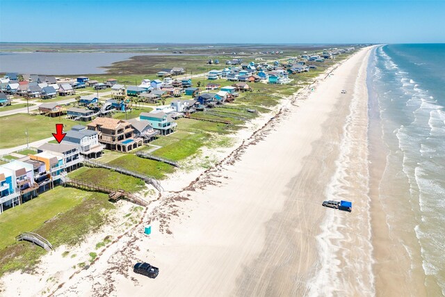 115 Southwind Dr, Surfside Beach, TX 77541 - bird's eye view of waterfront with a beach