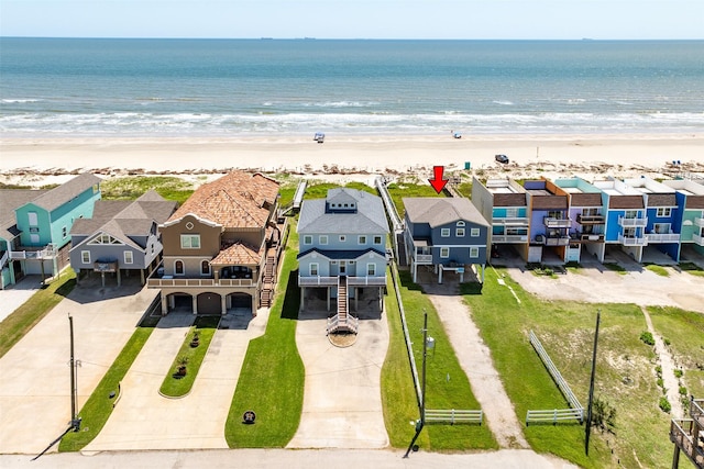 115 Southwind Dr, Surfside Beach, TX 77541 - aerial perspective of suburban area with waterfront with a beach