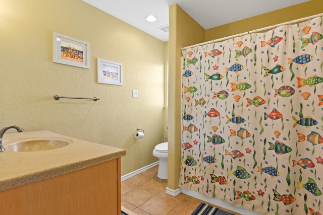 115 Southwind Dr, Surfside Beach, TX 77541 - bathroom with tile patterned floors, vanity, and a shower with shower curtain