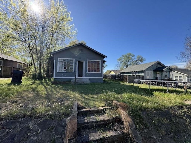 107 Electra St, Longview, TX 75602 - rear view of house with a trampoline