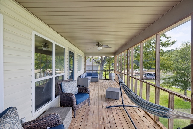 527 Caney Creek Dr, Livingston, TX 77351 - deck with ceiling fan and an outdoor living space