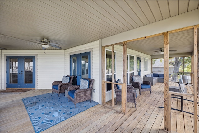 527 Caney Creek Dr, Livingston, TX 77351 - deck with french doors, a ceiling fan, and outdoor lounge area