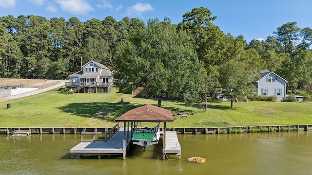527 Caney Creek Dr, Livingston, TX 77351 - dock area with a water view and a lawn