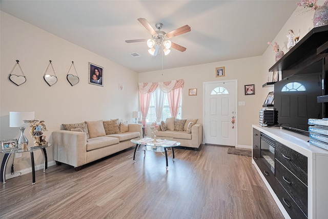 3638 Bright Moon Ct, Katy, TX 77449 - living room with light wood-style floors and a ceiling fan