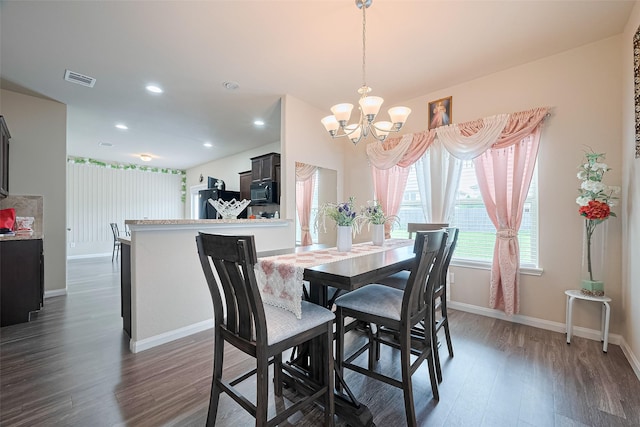 3638 Bright Moon Ct, Katy, TX 77449 - dining area with a chandelier, dark wood-style floors, and recessed lighting