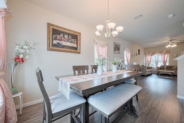 3638 Bright Moon Ct, Katy, TX 77449 - dining space featuring a chandelier, dark wood finished floors, and a ceiling fan
