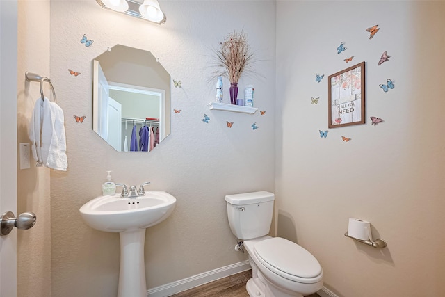 3638 Bright Moon Ct, Katy, TX 77449 - bathroom with toilet and wood finished floors