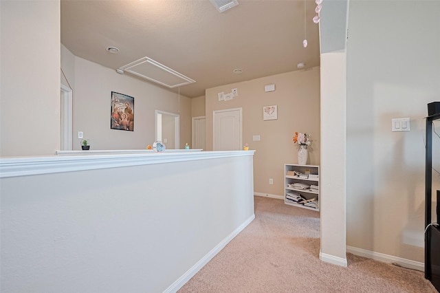 3638 Bright Moon Ct, Katy, TX 77449 - hallway featuring attic access and light carpet