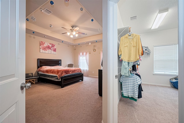3638 Bright Moon Ct, Katy, TX 77449 - bedroom featuring carpet flooring, a raised ceiling, and ceiling fan