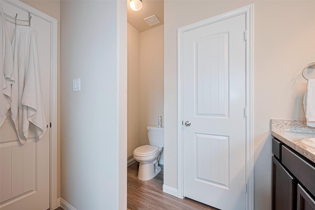 3638 Bright Moon Ct, Katy, TX 77449 - bathroom featuring vanity and wood finished floors