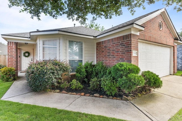 2306 Urban Forest Ct, Spring, TX 77386 - ranch-style home with brick siding, an attached garage, roof with shingles, and driveway