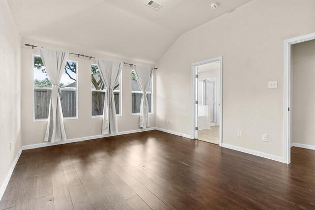 2306 Urban Forest Ct, Spring, TX 77386 - spare room with vaulted ceiling, hardwood / wood-style floors, and a smoke detector