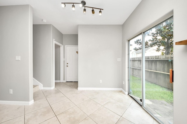 2214 Naomi St, Houston, TX 77054 - empty room with light tile patterned floors and baseboards
