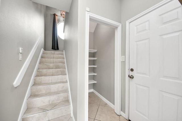 2214 Naomi St, Houston, TX 77054 - stairway featuring tile patterned floors and baseboards