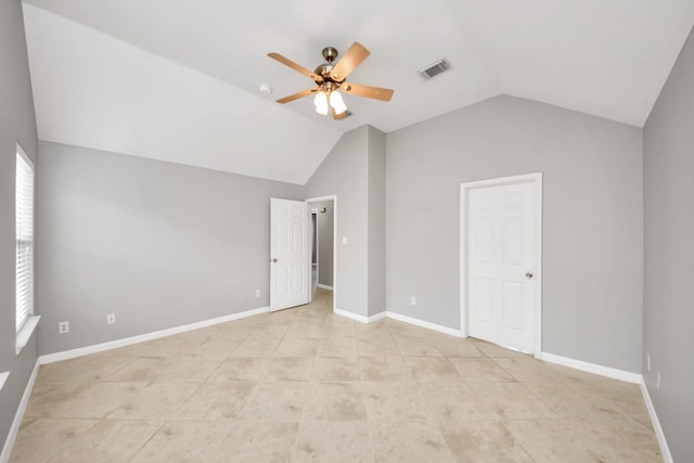 2214 Naomi St, Houston, TX 77054 - unfurnished bedroom with vaulted ceiling, light tile patterned flooring, and ceiling fan