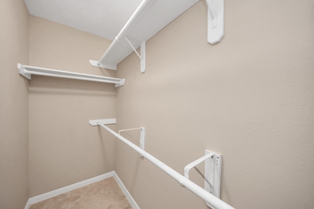 2214 Naomi St, Houston, TX 77054 - spacious closet featuring light tile patterned floors
