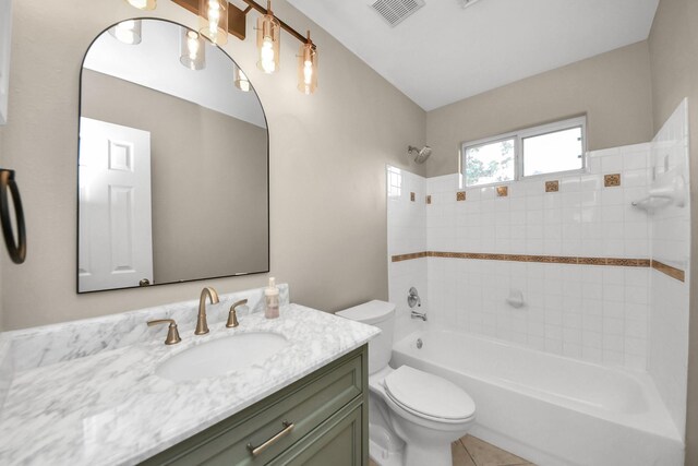 2214 Naomi St, Houston, TX 77054 - bathroom featuring vanity, shower / bathtub combination, and tile patterned floors
