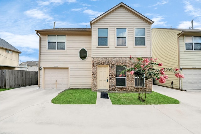 2214 Naomi St, Houston, TX 77054 - traditional-style house featuring driveway, a garage, and brick siding