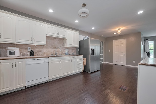 1725 County Road 244e, Brazoria, TX 77422 - kitchen with dishwasher, stainless steel fridge, tasteful backsplash, dark wood-style flooring, and recessed lighting