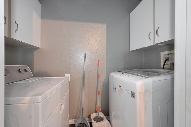 1725 County Road 244e, Brazoria, TX 77422 - washroom featuring cabinet space and washing machine and dryer