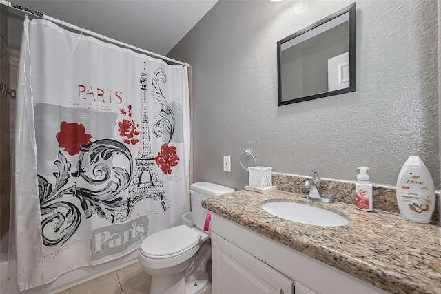 1725 County Road 244e, Brazoria, TX 77422 - full bathroom with vanity, tile patterned flooring, and shower / bath combo with shower curtain