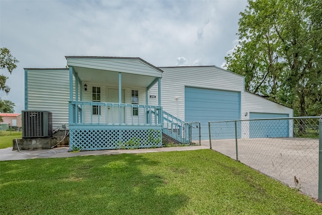 1725 County Road 244e, Brazoria, TX 77422 - view of front of house with a porch and a garage