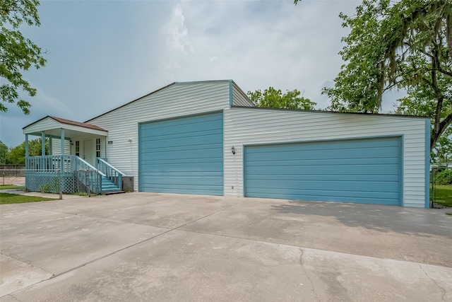 1725 County Road 244e, Brazoria, TX 77422 - detached garage with a porch