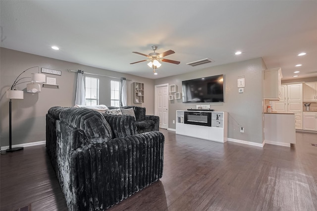 1725 County Road 244e, Brazoria, TX 77422 - living room with a ceiling fan, dark wood-type flooring, and recessed lighting