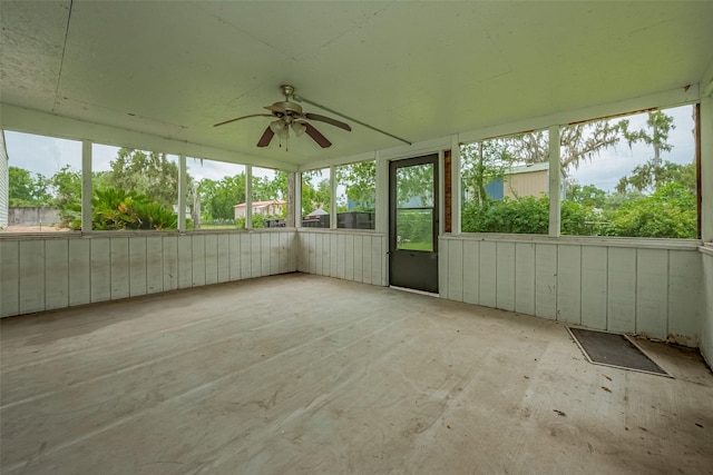 1725 County Road 244e, Brazoria, TX 77422 - unfurnished sunroom featuring a ceiling fan and plenty of natural light
