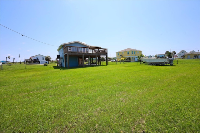 4022 3rd St, Galveston, TX 77554 - view of green lawn featuring a deck