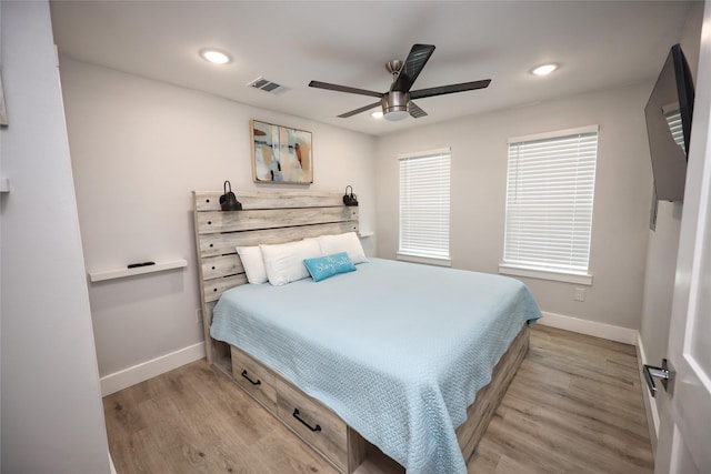 4022 3rd St, Galveston, TX 77554 - bedroom featuring light wood-type flooring, recessed lighting, and a ceiling fan