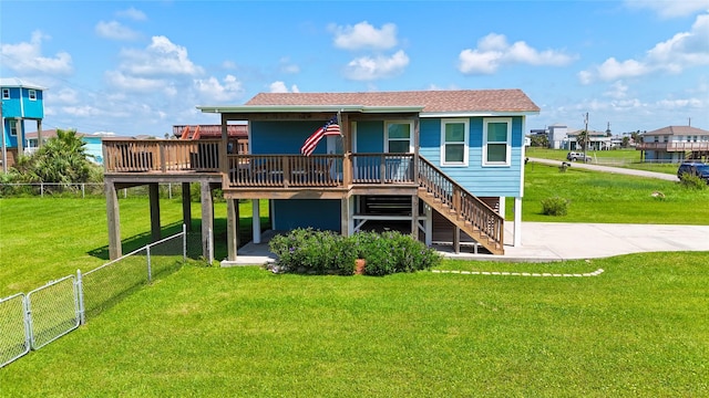4022 3rd St, Galveston, TX 77554 - back of house with a wooden deck, stairway, a patio, and roof with shingles