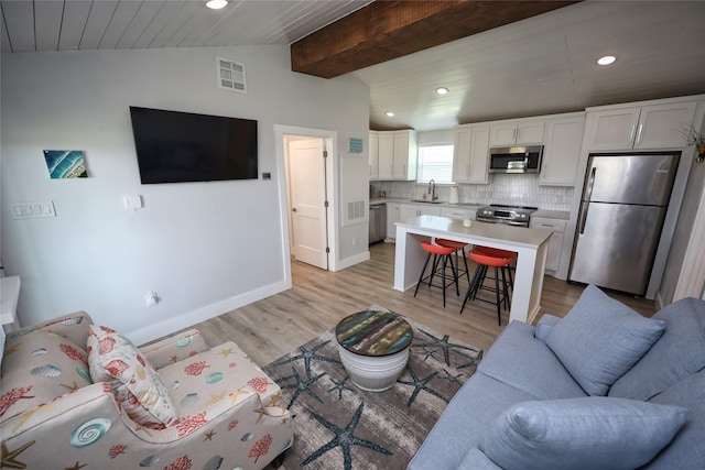 4022 3rd St, Galveston, TX 77554 - living room featuring recessed lighting and light wood finished floors
