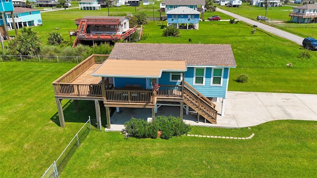 4022 3rd St, Galveston, TX 77554 - back of house with a deck, stairway, and a residential view