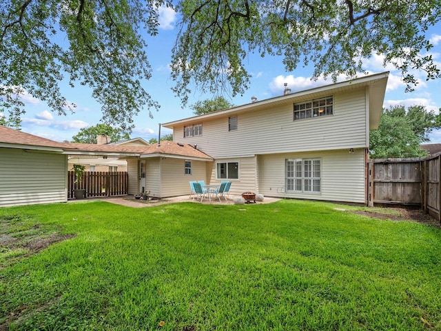 16434 Heatherdale Dr, Houston, TX 77059 - rear view of house with a fenced backyard and a patio area