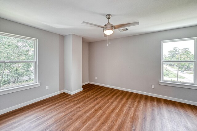 8125 Eastover St Unit Ab, Houston, TX 77028 - empty room featuring wood finished floors and a ceiling fan