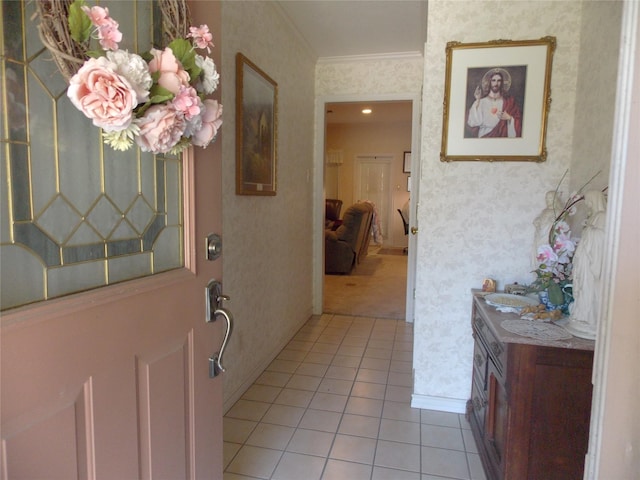 1501 E Pecan St, Brenham, TX 77833 - entrance foyer featuring wallpapered walls, light tile patterned flooring, and crown molding