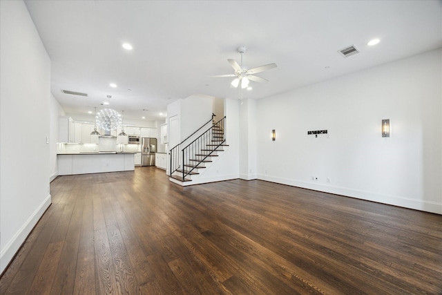 2509 Dorrington Blvd Unit B, Houston, TX 77030 - unfurnished living room featuring dark wood finished floors, stairs, recessed lighting, and ceiling fan