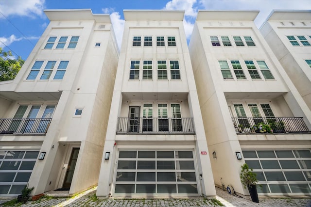 2509 Dorrington Blvd Unit B, Houston, TX 77030 - view of building exterior with an attached garage