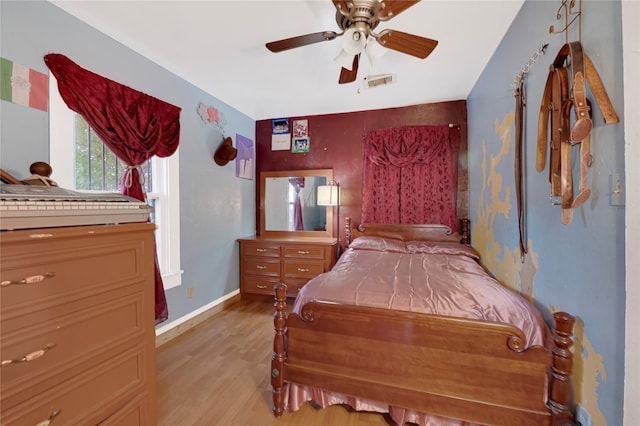 4103 Lumber Ln, Houston, TX 77016 - bedroom featuring light wood-style floors and a ceiling fan